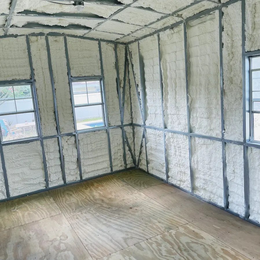 Closed-cell spray foam insulation applied to wall cavities in a residential project in Clarksburg